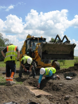 Excavation of grave slab